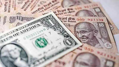 rupee recovers from record low rises 21 paise to 86